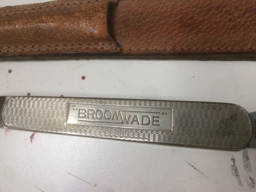 BroomWade letter knife in leather sheath. Stainless 9 1/4\" closed length 11 1/4\" opened length.