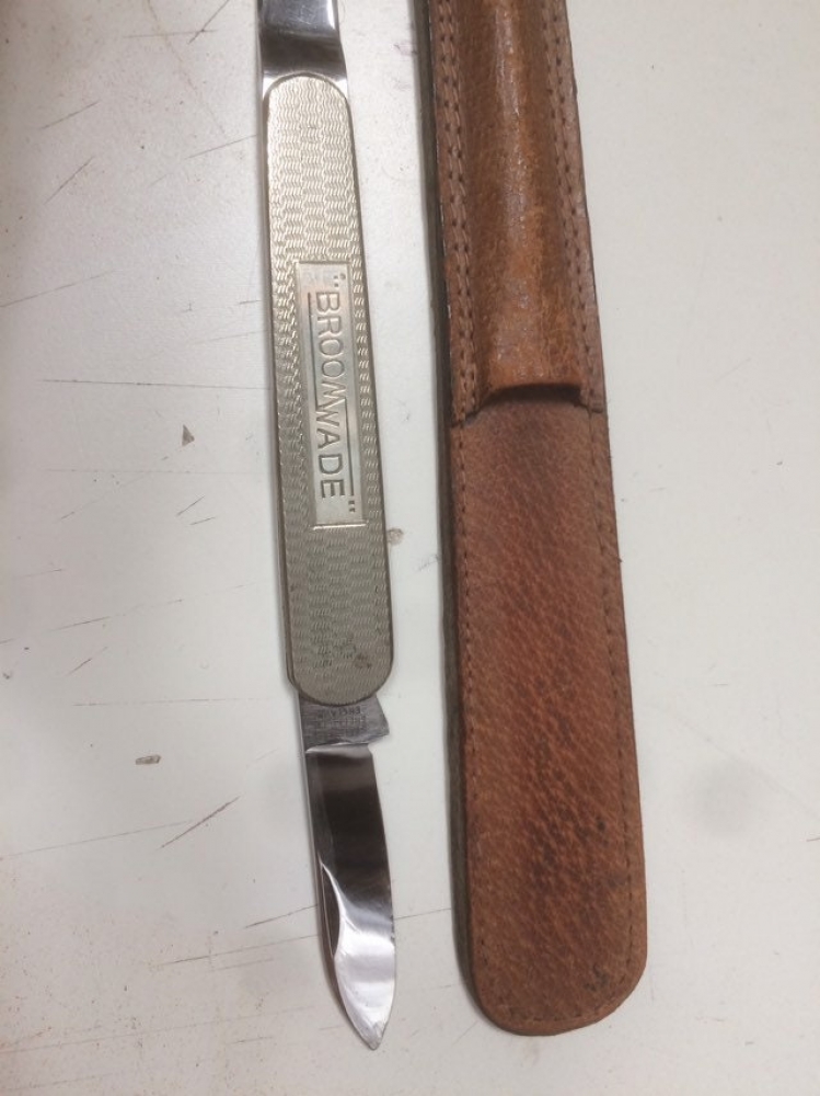 BroomWade letter knife in leather sheath. Stainless 9 1/4\" closed length 11 1/4\" opened length.