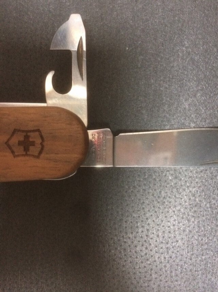 Victorinox 'Evowood 17 Walnut handle mid size 2 1/2\" blade. 13 functions