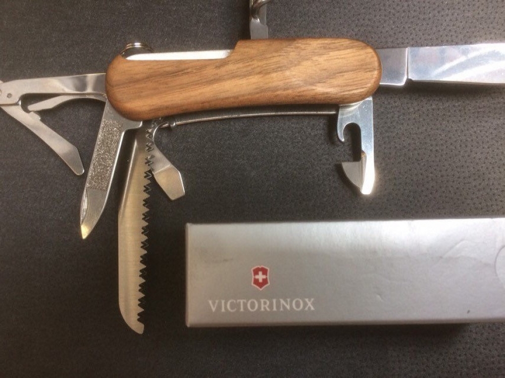 Victorinox 'Evowood 17 Walnut handle mid size 2 1/2\" blade. 13 functions