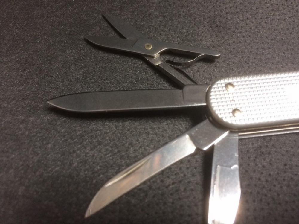 Victorinox 'Minichamp' Alox Silver. Successful manicure knife, scissors, key fob friend.