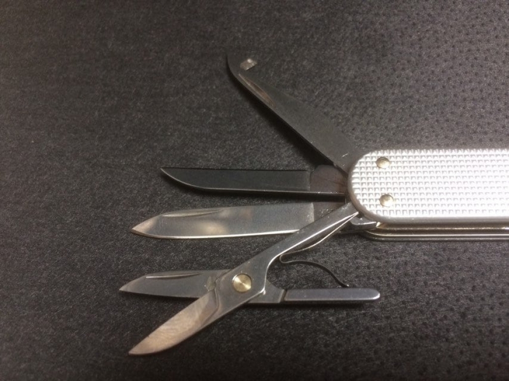 Victorinox 'Minichamp' Alox Silver. Successful manicure knife, scissors, key fob friend.