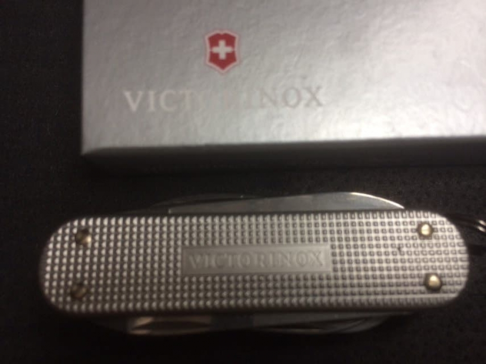 Victorinox 'Minichamp' Alox Silver. Successful manicure knife, scissors, key fob friend.