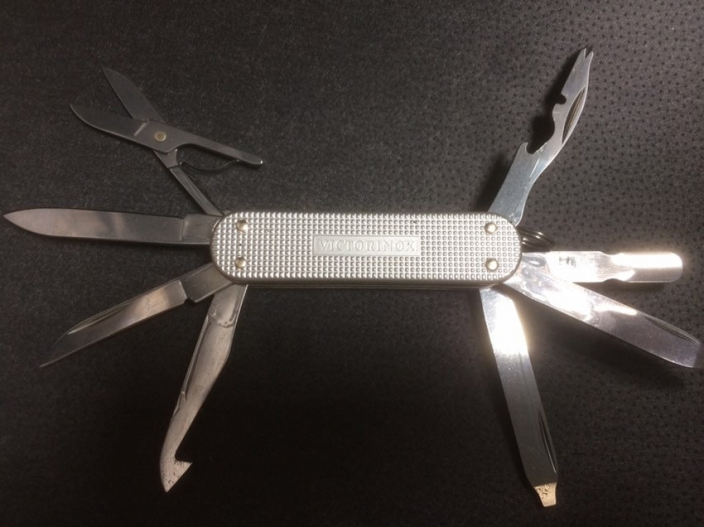 Victorinox 'Minichamp' Alox Silver. Successful manicure knife, scissors, key fob friend.