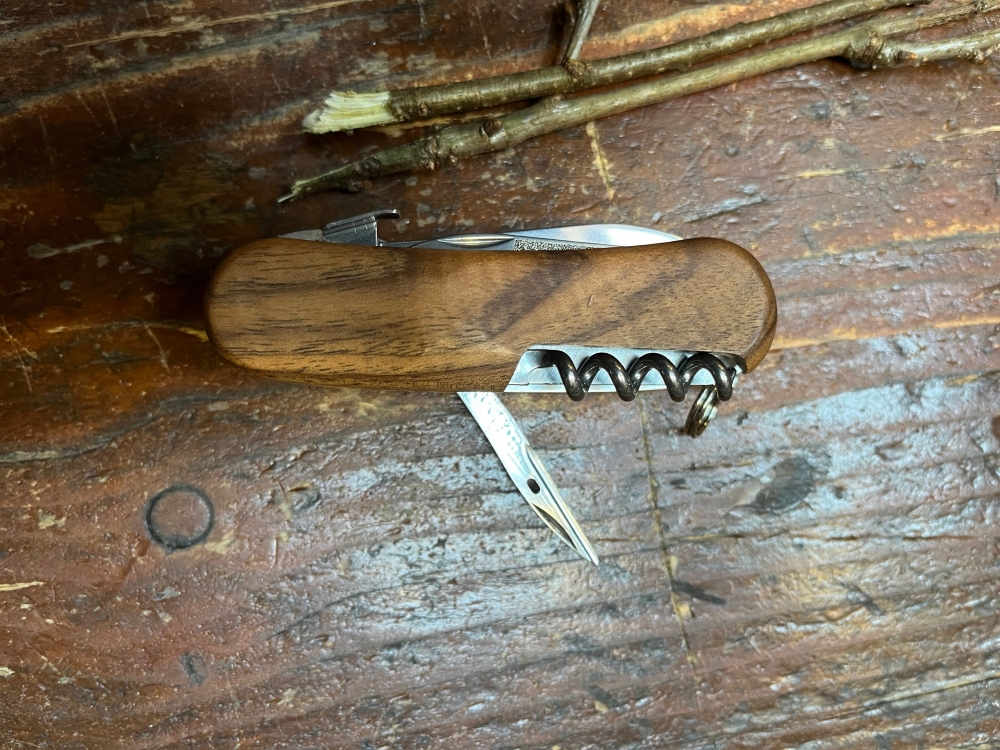 Victorinox Evowood S557 Walnut with 12 tools. Weighs 125grams