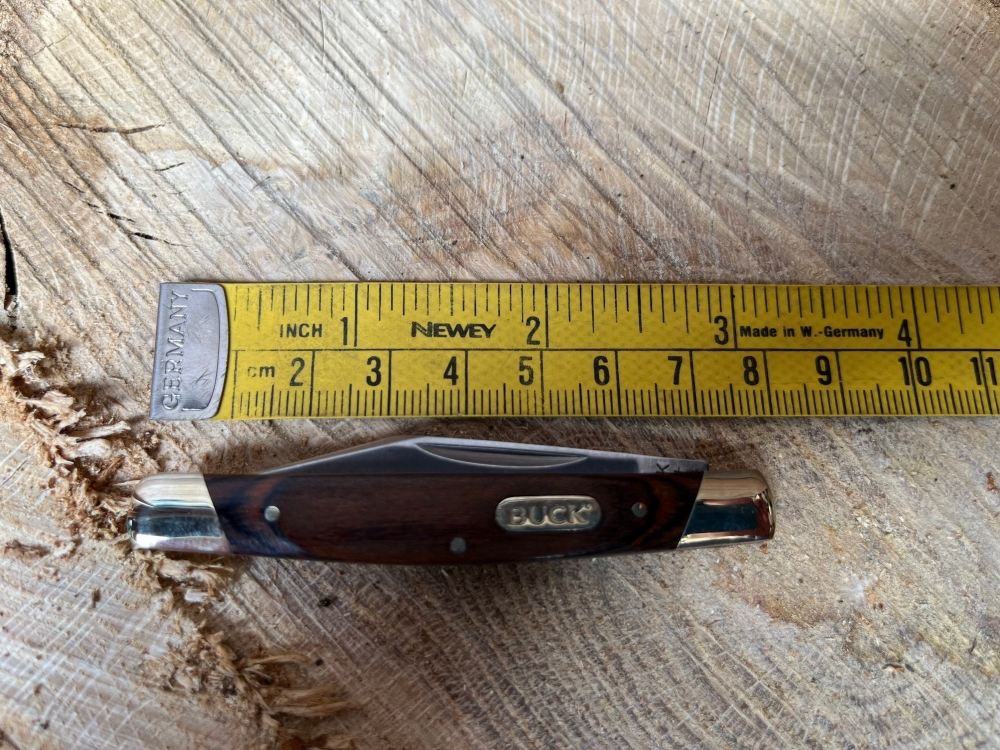 Buck Solo small easy opening occasional use pocket knife in wood grain & silver