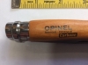 Opinel No. 7VRN locking Carbon Steel Blade Beech Handle, a handy hand size