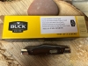 Buck Solo small easy opening occasional use pocket knife in wood grain & silver