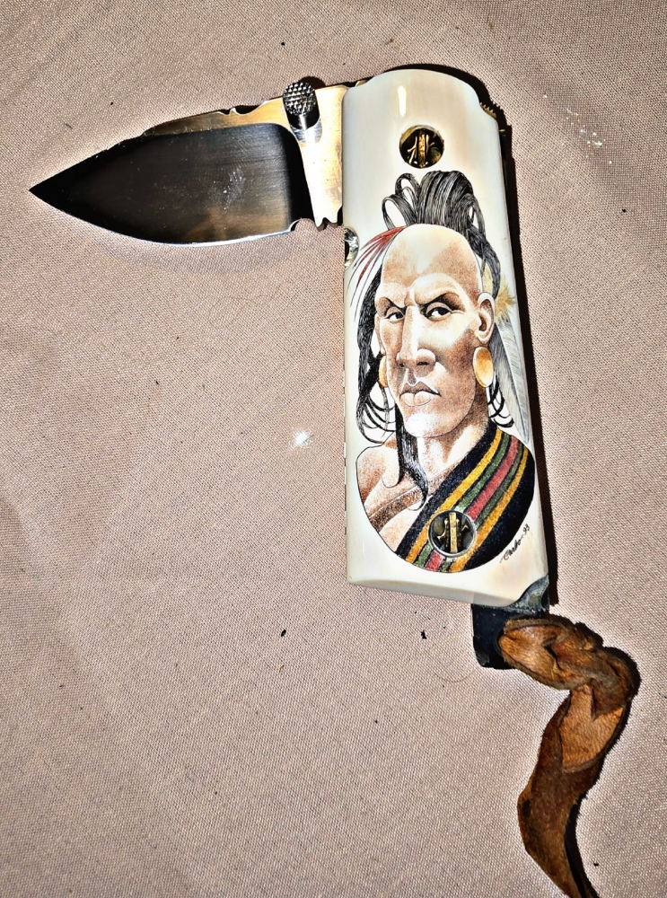 Hand made COLT 45 grips by Gene Barnett ⁹in fossil Mammoth tusk with SCRIMSHAW of native American by Gary Williams 
