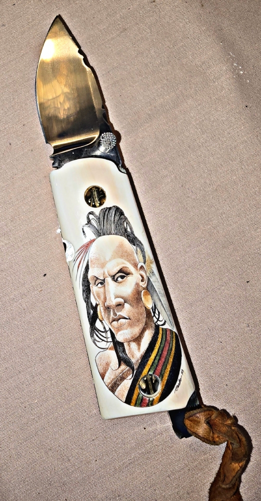 Hand made COLT 45 grips by Gene Barnett ⁹in fossil Mammoth tusk with SCRIMSHAW of native American by Gary Williams 