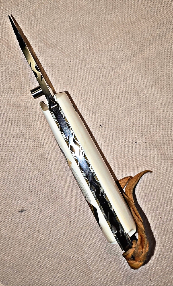 Hand made COLT 45 grips by Gene Barnett ⁹in fossil Mammoth tusk with SCRIMSHAW of native American by Gary Williams 