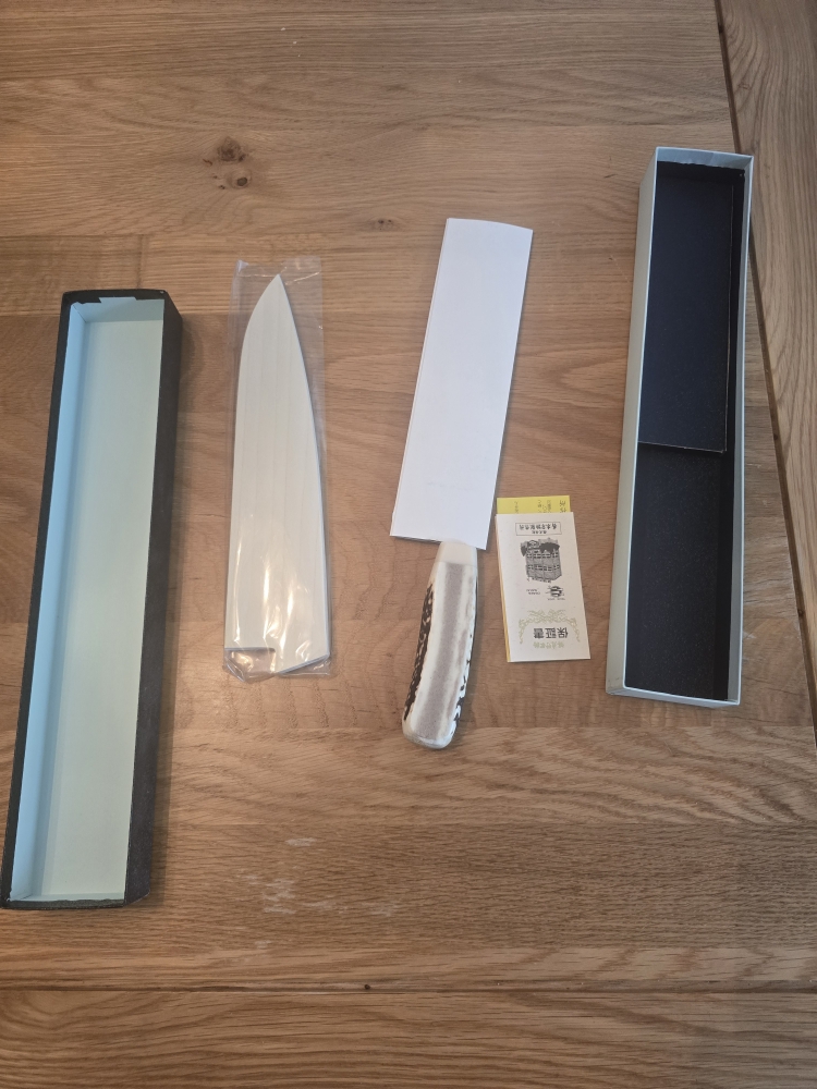 Sakai Takayuki antler handle knife 45 Layer damascus