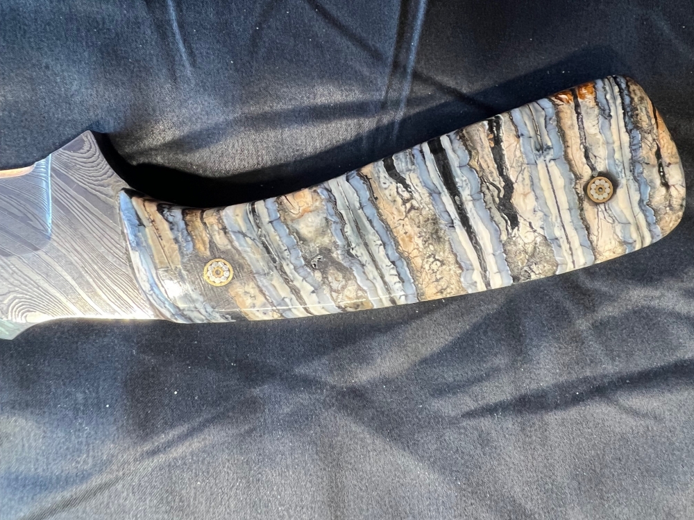 Mastodon Scales, \"Sharpfinger\" design Damascus blade. A Showpiece AND a user!