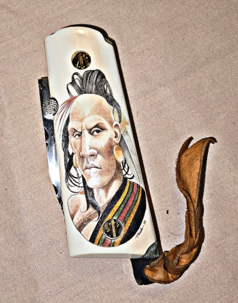 Hand made COLT 45 grips by Gene Barnett ⁹in fossil Mammoth tusk with SCRIMSHAW of native American by Gary Williams 