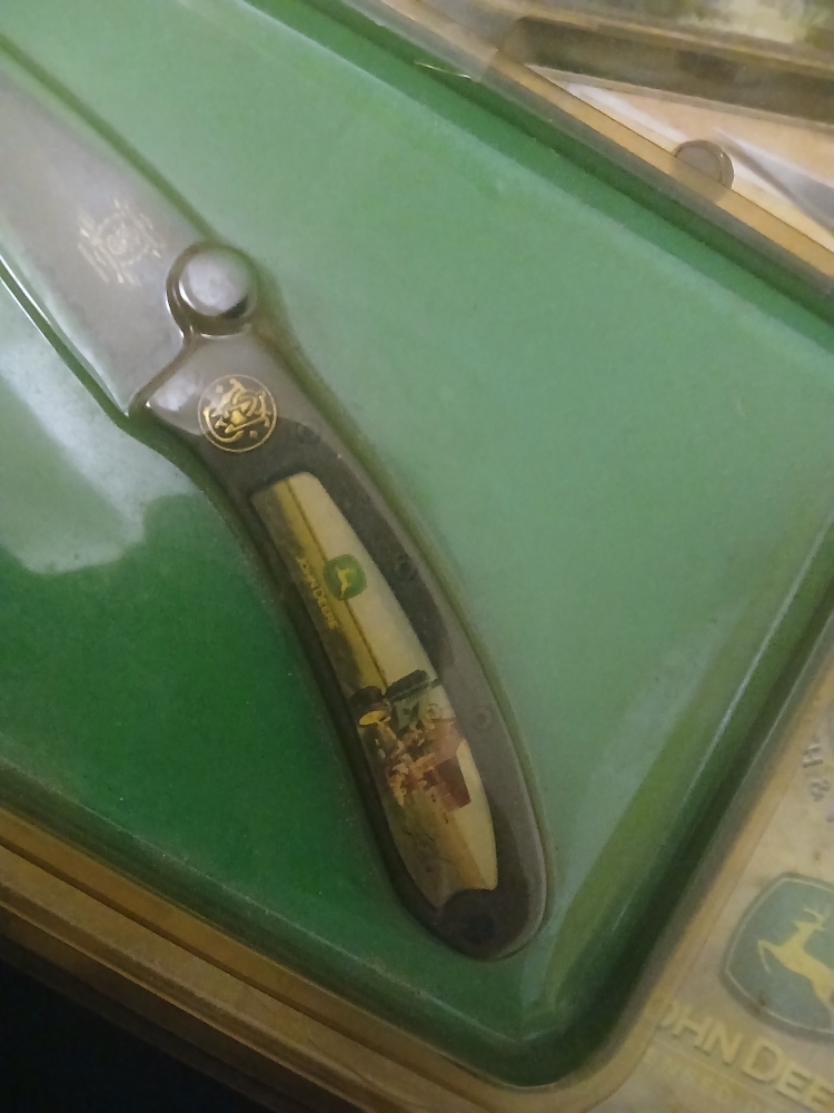150 yr anniversary golfen series john deere smith and wesson collector series. Donald Zolan signature folding knife and tin