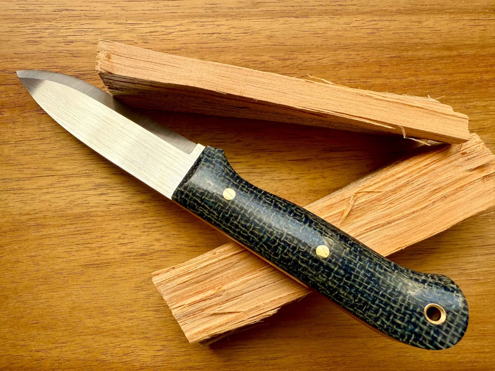 Bushcraft Knife. Scandi grind. Handcrafted. AEB-L Steel. 61 HRC Cryo. For Outdoor and Camping
