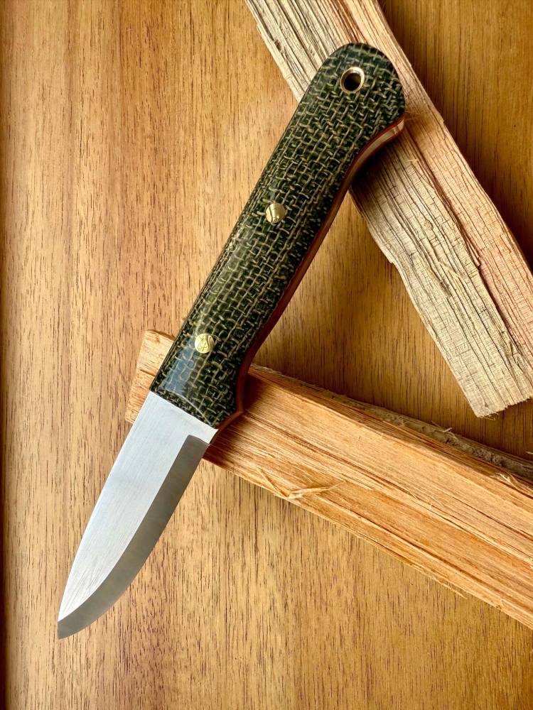Bushcraft Knife. Scandi grind. Handcrafted. AEB-L Steel.  61 HRC Cryo.