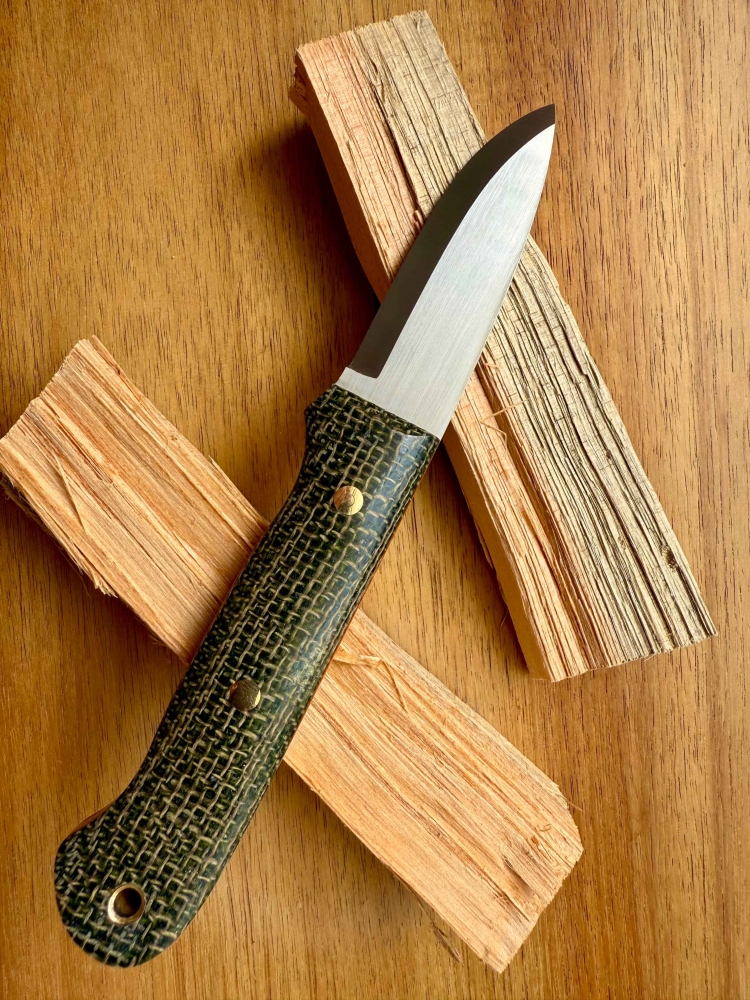 Bushcraft Knife. Scandi grind. Handcrafted. AEB-L Steel.  61 HRC Cryo.
