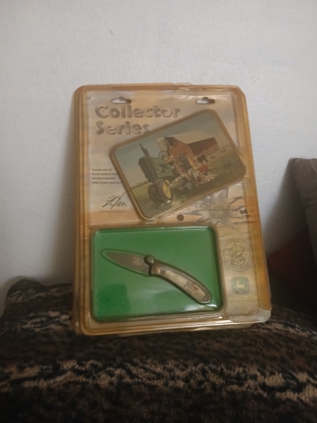 150 yr anniversary golfen series john deere smith and wesson collector series. Donald Zolan signature folding knife and tin