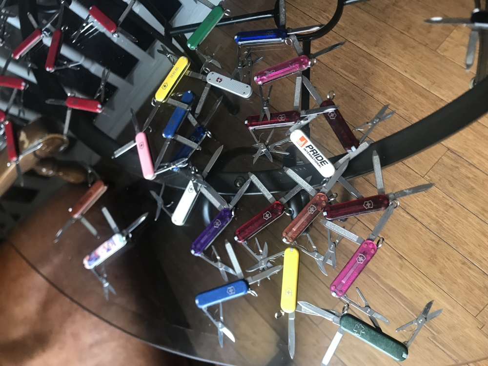 Selling Lot of 53 Victorinox and 4 Wenger Swiss Army Knives ~ 58 mm