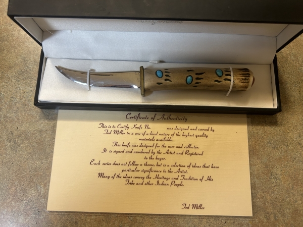 Handcrafted collectible bear paw print knife with turquoise