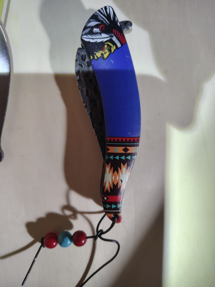 Indian head folding knife