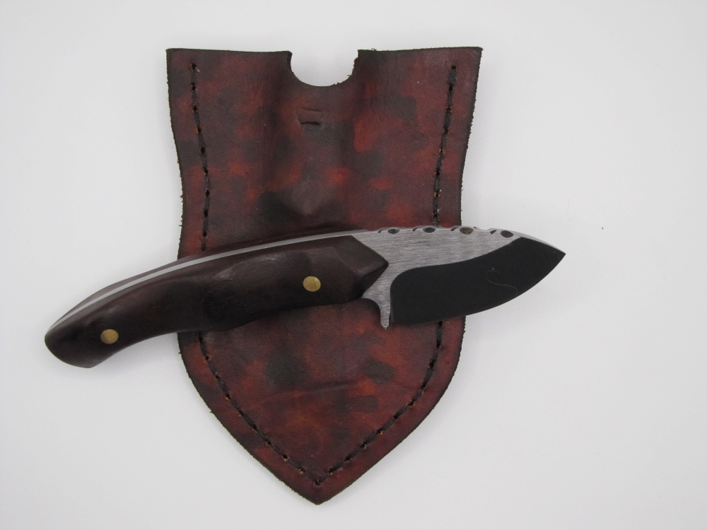 1095 high carbon steel caping knife with a drop point with natural wood handles