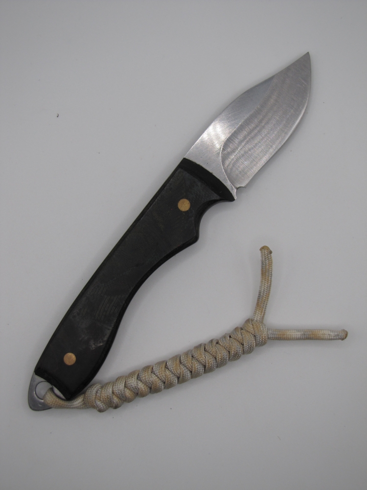1095 highcarbon steel clip point skinning/utility knife with a green burlap micarta handle