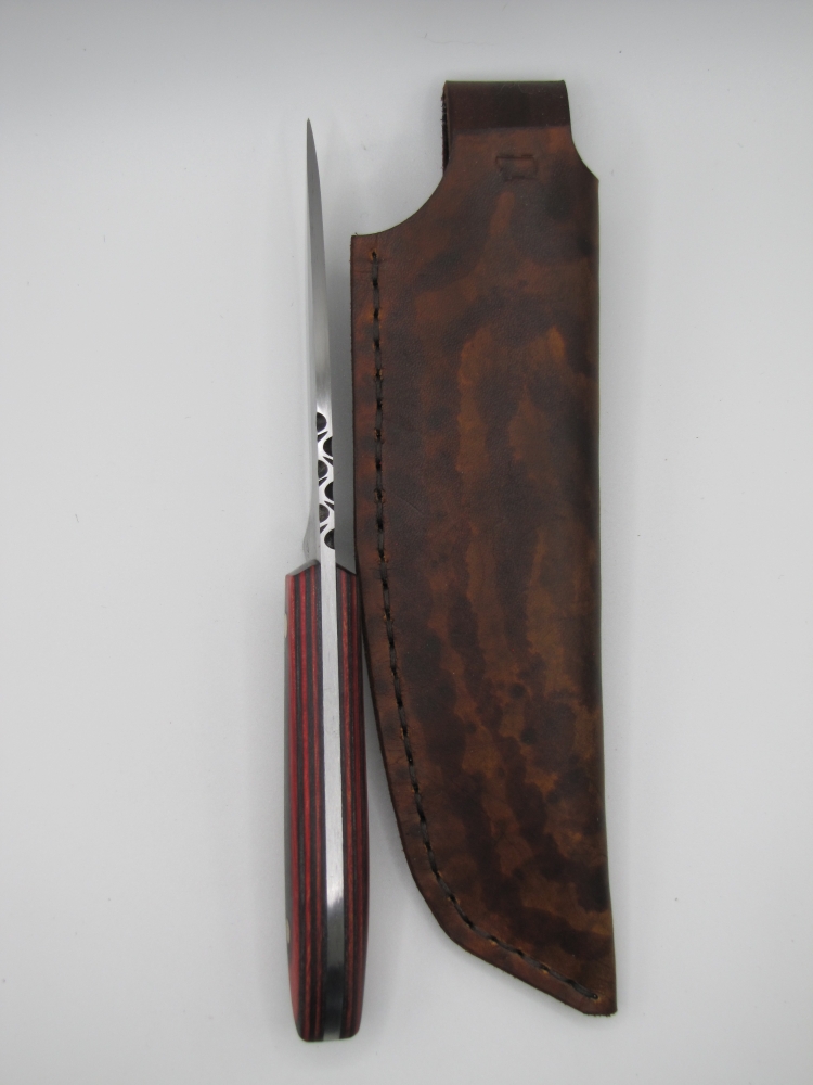 drop point utility knife 1095 high carbon steel with a red and back dymalux handle