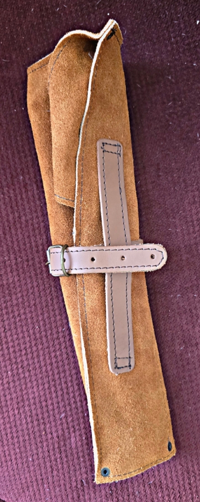 Triple set of kitchen knives. Swede leather carry case. Pakka wood handle. Dishwasher safe.  Colors available RED, BLUE, YELLOW. 