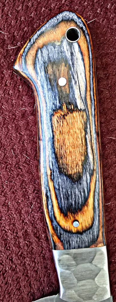 Triple set of kitchen knives. Swede leather carry case. Pakka wood handle. Dishwasher safe.  Colors available RED, BLUE, YELLOW. 