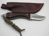 1095 high carbon steel clip point utility knife with a burlap micarta handle