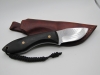 1095 high carbon steel drop point skinning knife with a black micarta handle