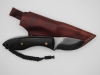1095 high carbon steel drop point skinning knife with a black micarta handle