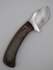 1095 high carbon steel drop point big belly skinner with a red walnut black dymalux handle
