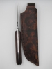 1095 highcarbon steel drop point utility knife with a walnut dymalux handle