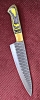 Triple set of kitchen knives. Swede leather carry case. Pakka wood handle. Dishwasher safe.  Colors available RED, BLUE, YELLOW. 