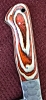 Triple set of kitchen knives. Swede leather carry case. Pakka wood handle. Dishwasher safe.  Colors available RED, BLUE, YELLOW. 
