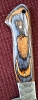 Triple set of kitchen knives. Swede leather carry case. Pakka wood handle. Dishwasher safe.  Colors available RED, BLUE, YELLOW. 