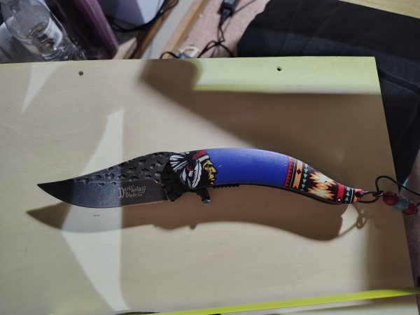 Indian head folding knife