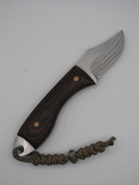 1095 high carbon steel clip point utility knife with a burlap micarta handle