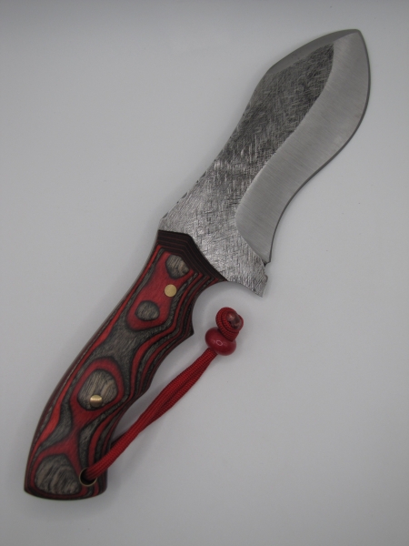 1095 high carbon steel camp knife with a red and black dymalux handle