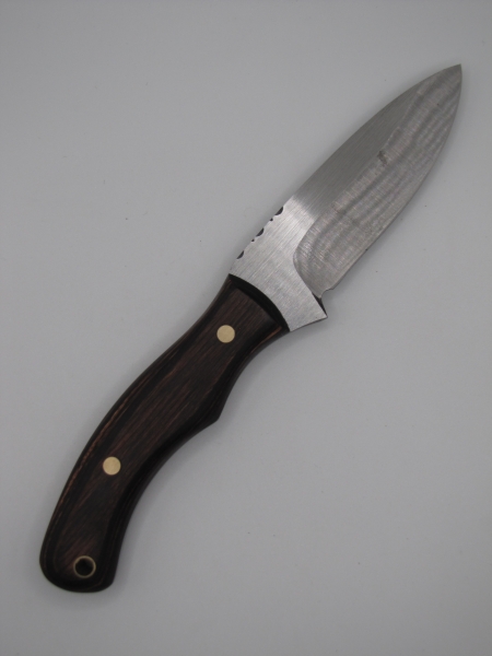 1095 highcarbon steel drop point utility knife with a walnut dymalux handle