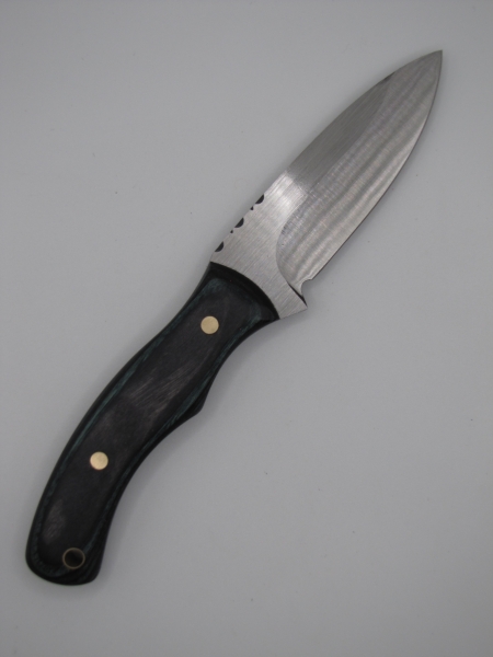 1095 high carbon steel drop point utility knife with a indigo and black dylamux handle 