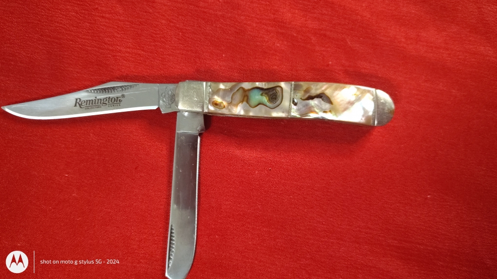 Remington Collector’s Series Dual-Blade Pocket Knife – Iridescent Handle – $75