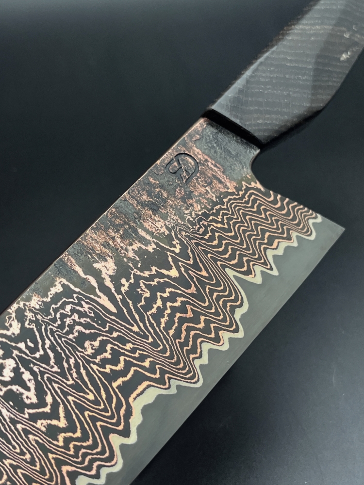 Apex ultra core with copperdamascus cladding