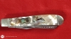 Remington Collector’s Series Dual-Blade Pocket Knife – Iridescent Handle – $75