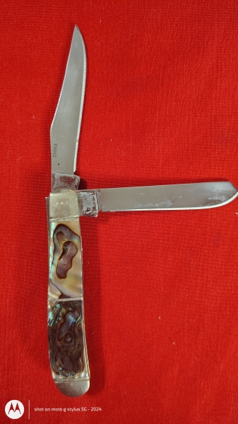 Remington Collector’s Series Dual-Blade Pocket Knife – Iridescent Handle – $75