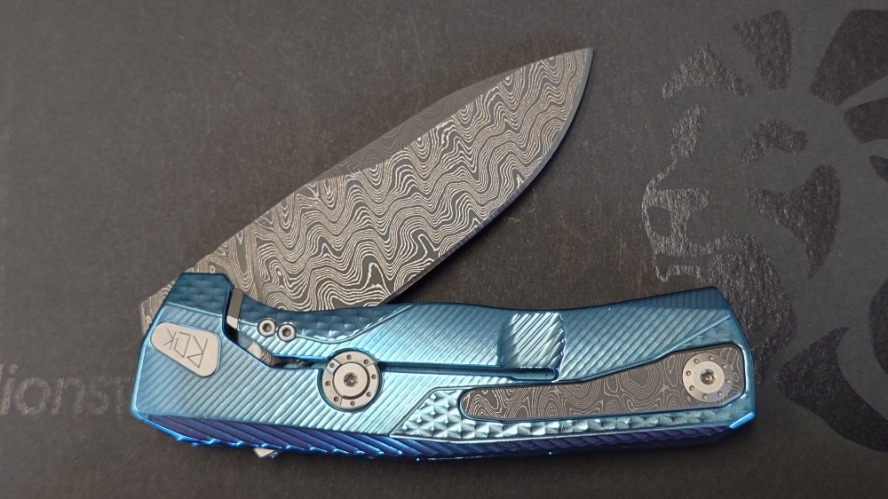 Lionsteel ROK Damascus blue titanium 