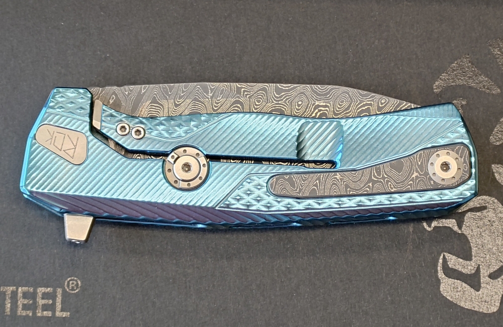 Lionsteel ROK Damascus blue titanium 